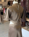 Elsie Midi Dress back view showing zip closure and satin drape on mannequin