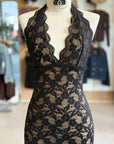Close-up of Eva Mesh Midi Dress deep V-neck and scalloped lace trim.