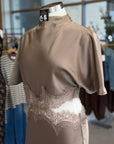 Elsie Midi Dress close-up of mock neck, short flutter sleeve and lace waist detail