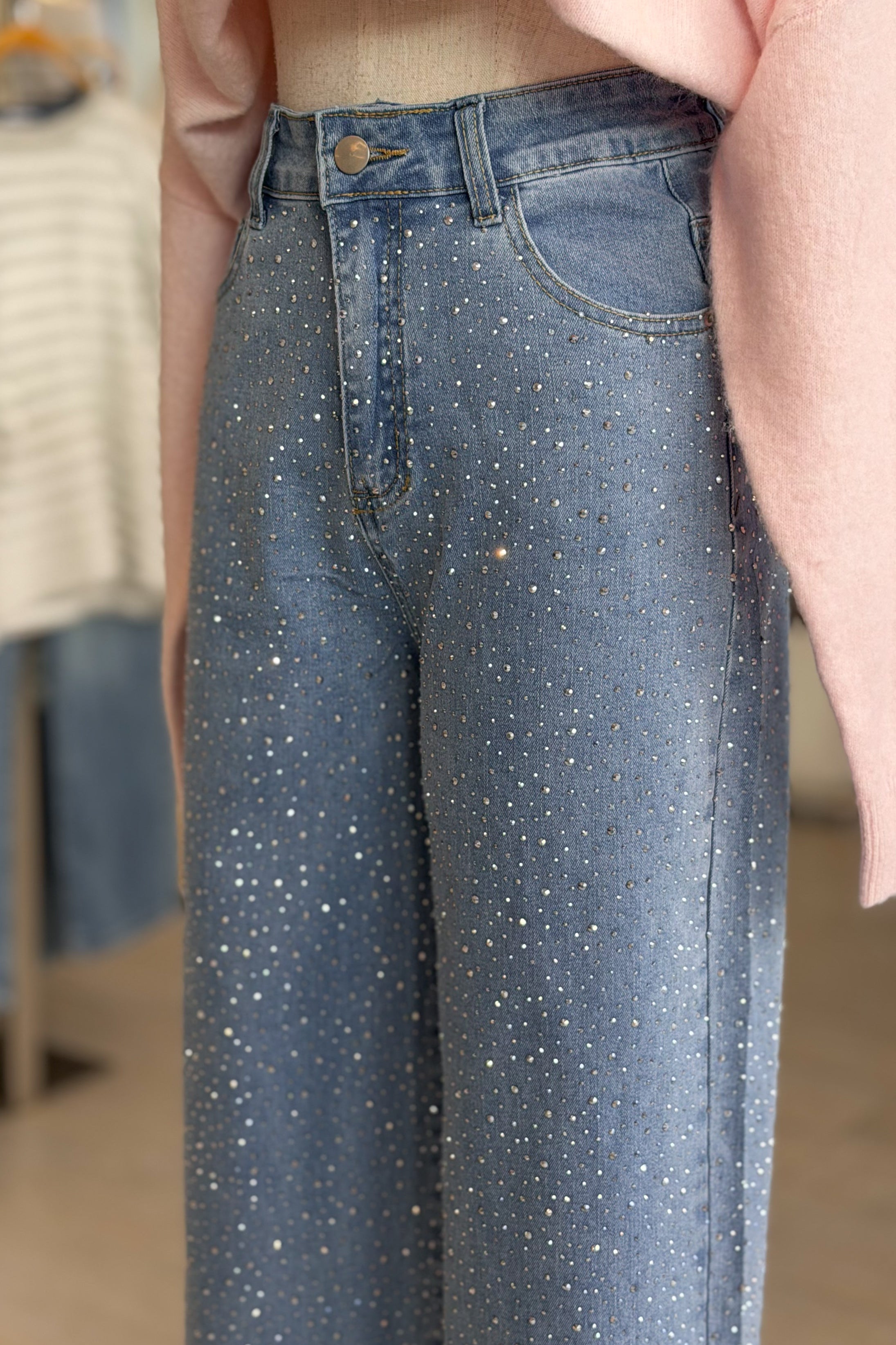 Close-up of blue jeans with a blurred background